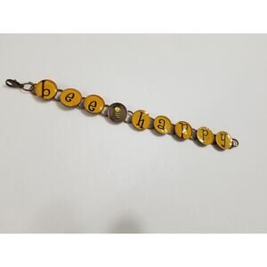 Copper colored six inch Bee happy bracelet b41